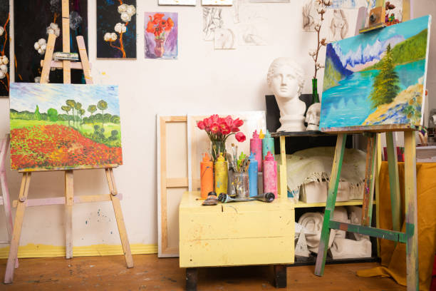 istock Two amazing landscapes standing on drawing easel in workshop 1153173356