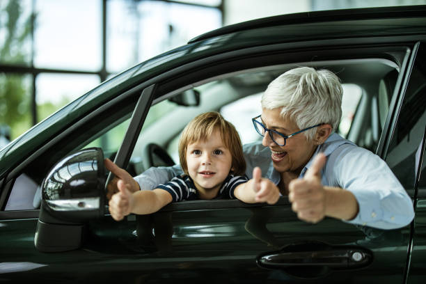 私たちはこの車が大好きです! - thumbs up child success winning ストックフォトと画像