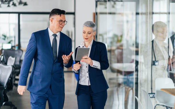 istock Business partners in discussion 1153176785