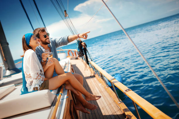 istock Young couple on a sailing cruise. 1153176887