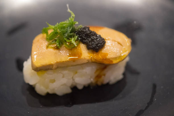 istock Close-up Foie Gras sushi in black plate 1153178801