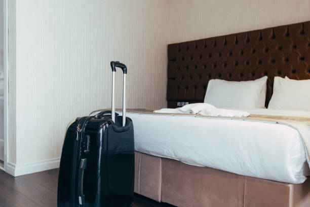 istock Luggage in the hotel room 1153182181