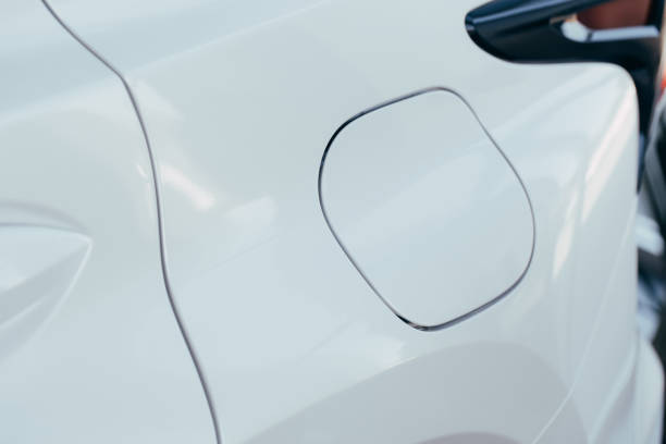 istock Closeup of car tail light on a white car 1153182434