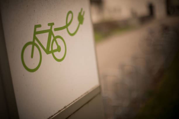 istock Electrical bike charging station sign 1153184493