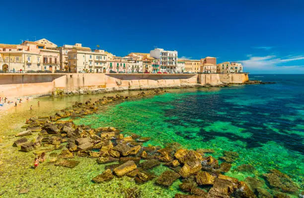 Cityscape of Ortygia. City beach in the historical center of Syracuse, famous place on Sicily, Italy.