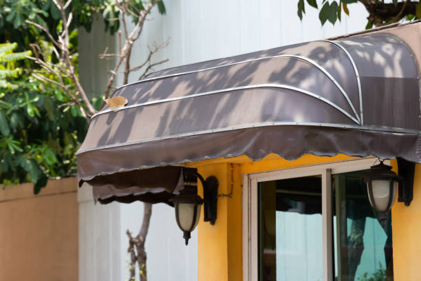istock curve brown awning over window. 1153196467