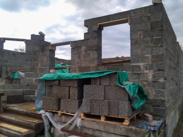 istock Building a house from the block in the close-up 1153197616