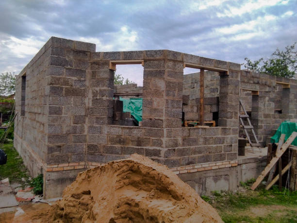 istock Building a house from the block in the close-up 1153197749