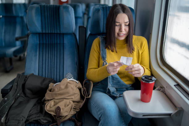 istock Young woman traveling by train 1153200079