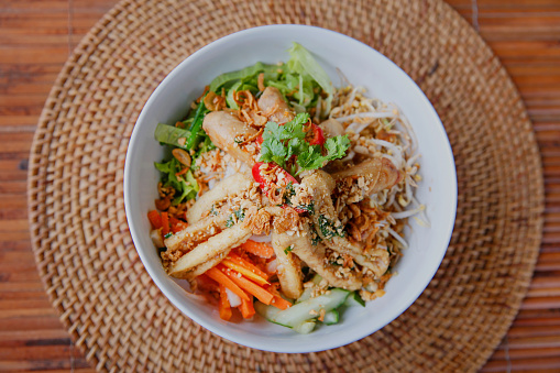 Close up bun thit nuong - vegetarian vietnamese noodle bowl with lemongrass tofu
