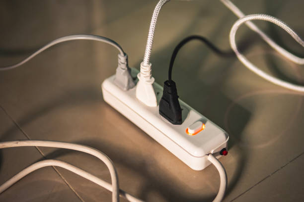 istock Electric plugs with power strip 1153201671