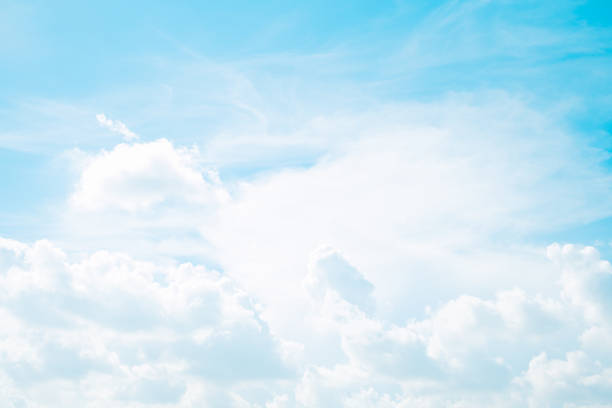 istock web banner spring and summer season with beauty clear and bright sky and cloudy background with copy space 1153202684
