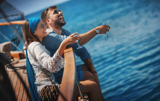 istock Young couple on a sailing cruise. 1153202759