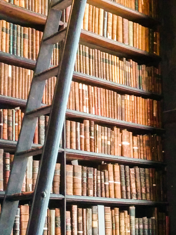Books in the old library at Trinity College, Dublin, Ireland.