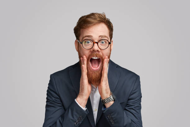 istock Excited ginger businessman making announcement 1153206640