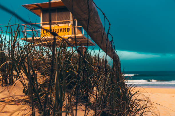 istock Fence near lifeguard cabin on beach 1153206725