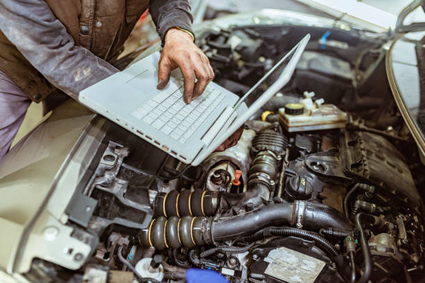 istock Professional car mechanic working in auto repair service. 1153208123