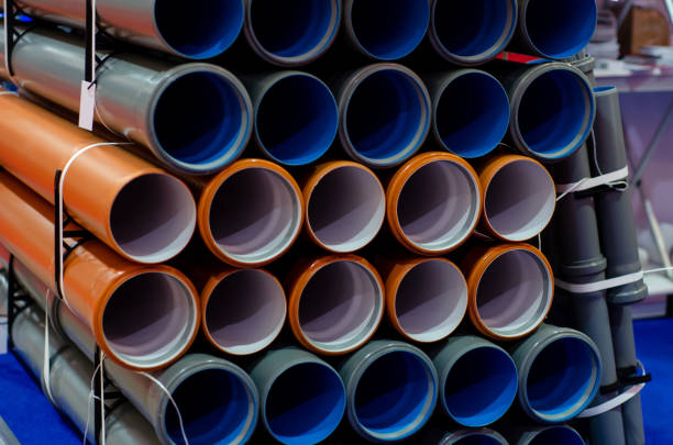 istock Many new PVC plastic pipes. 1153208304