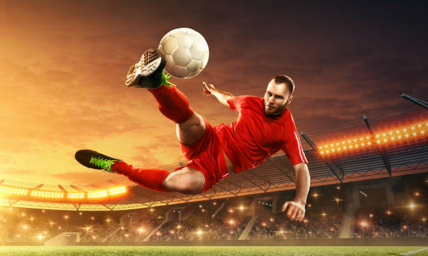 istock Soccer player kicking ball 1153212583