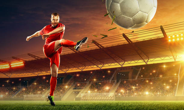 istock Soccer player kicking ball 1153212648