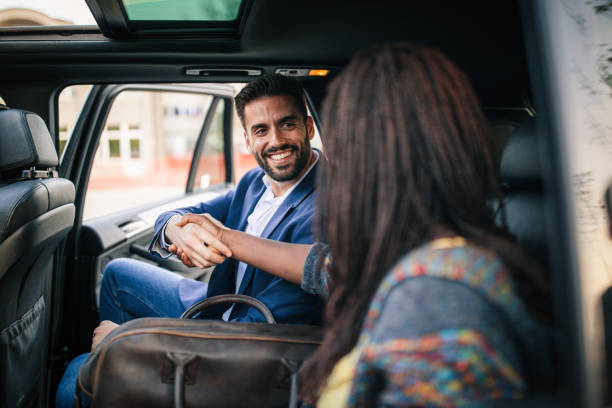 istock Friends hand shaking at the car 1153215282