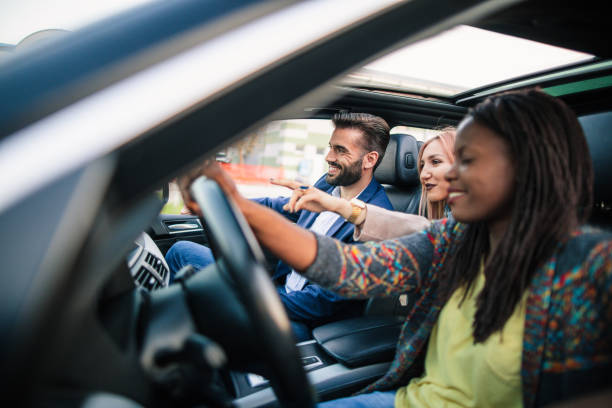 istock Friends sharing car for traveling 1153216076