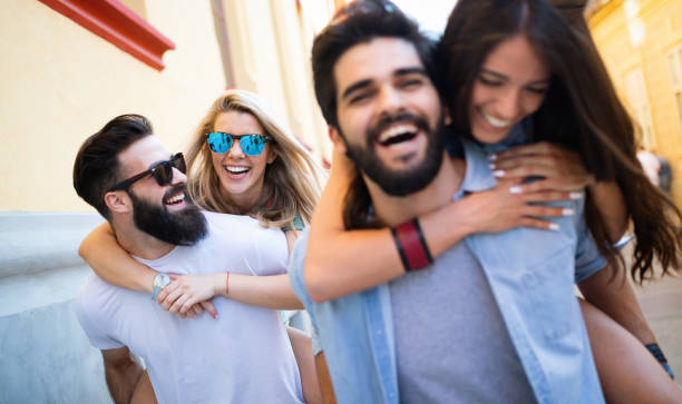 istock Group of friends having fun and spending good time together 1153216747