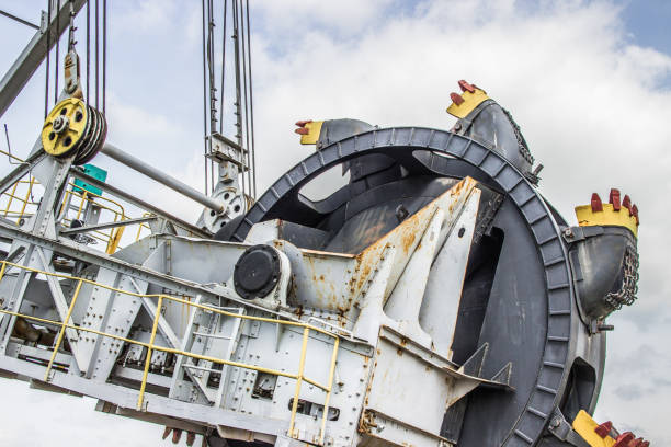 istock Opencast brown coal mine. Excavator  Extractive industry. 1153216808
