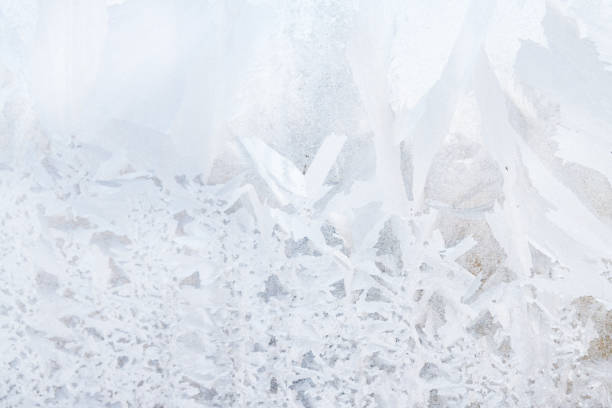 istock Frosty patterns on a frozen ice box in the early morning 1153216977