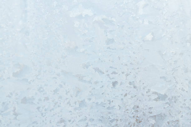 istock Frosty patterns on a frozen ice box in the early morning 1153217028