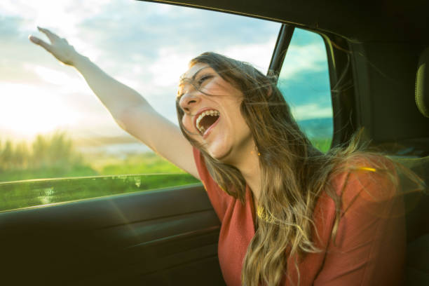 istock Enjoying the fresh air in a car 1153221246