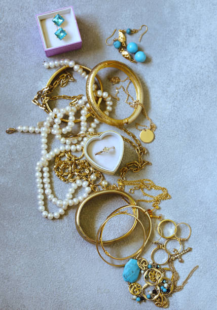 istock gold jewelery - chains, rings 1153222474