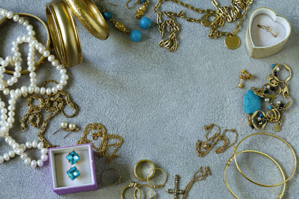 istock gold jewelery - chains, rings 1153222539
