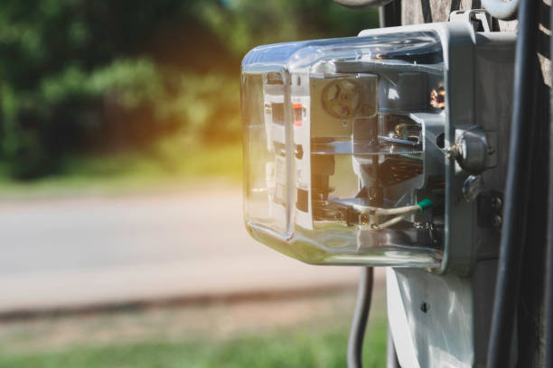 istock Electricity meter for house with sky background. 1153222965