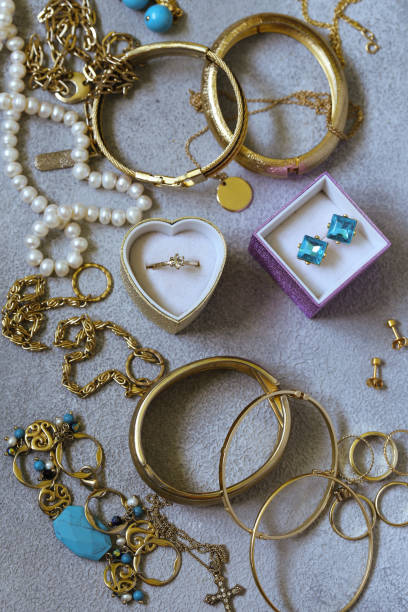istock gold jewelery - chains, rings 1153223970