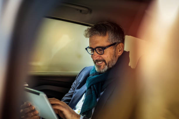 Senior busiessman in the car Serbia, Active Seniors, Adult, Adults Only, Back Seat, Businessman old rich white guy stock pictures, royalty-free photos & images