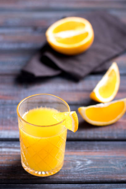 istock Fresh orange juice on the table,  rustic style 1153225000