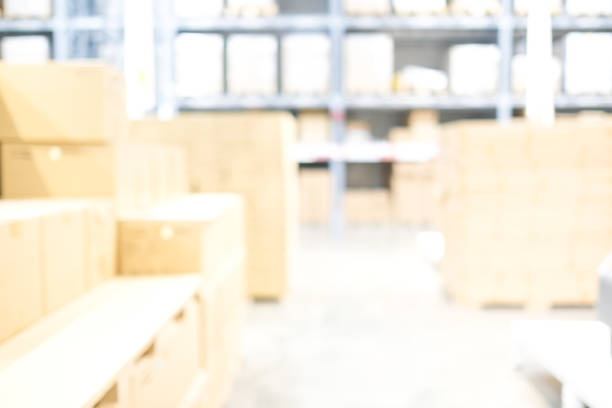 istock Blurred business background, Blur warehouse with bokeh light background 1153225445