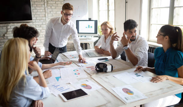 istock Successful business group of people at work in office 1153226018