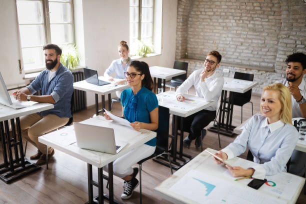 istock Successful business group of people at work in office 1153226079