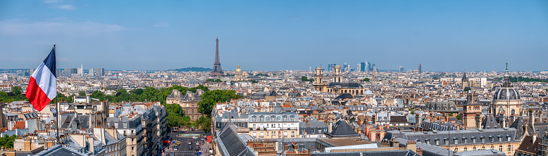 panoramic view of Paris with Eiffel Tower and French Flag