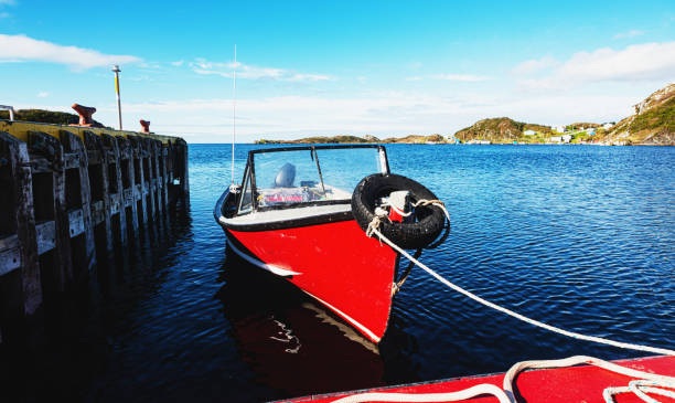 Towing a small boat along Newfoundland's South coast.