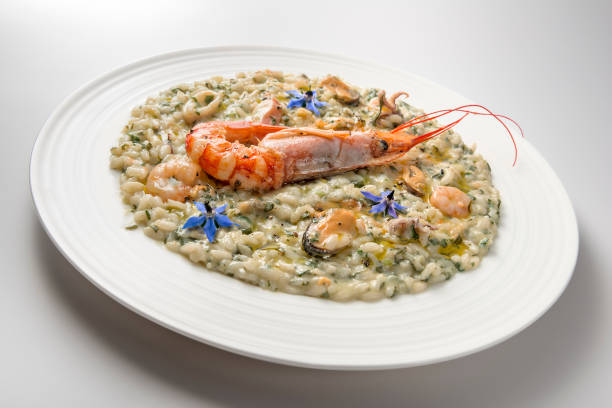 istock Risotto dish with borage shrimp and seafood 1153229698