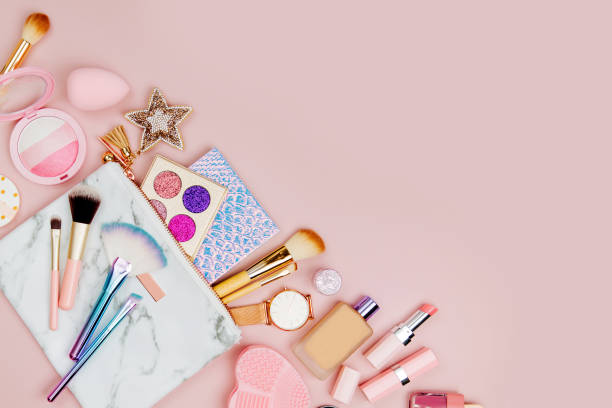istock Cosmetic bag with beauty accessory and makeup product. Flat lay 1153229843