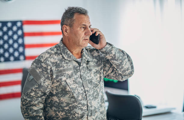 istock Senior soldier talking on smart phone 1153231074
