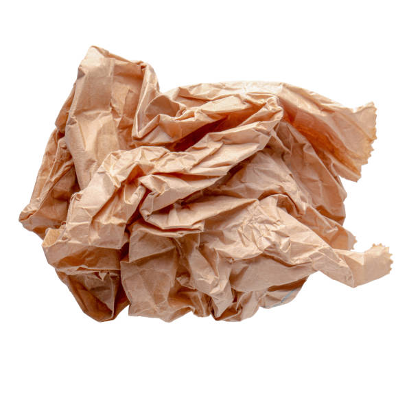 istock Used brown paper bag isolated over white background 1153234675