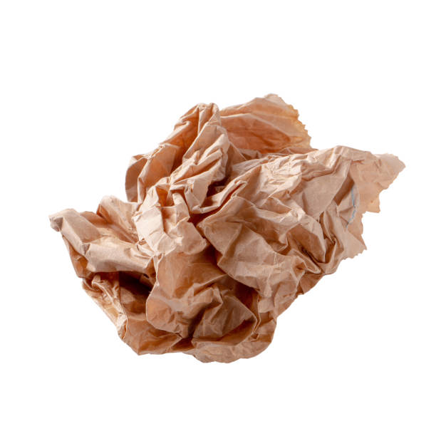 istock Used brown paper bag isolated over white background 1153234680