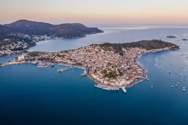 Photo of Amazing aerial photo from drone of Poros Greece island. Sunset in paradise