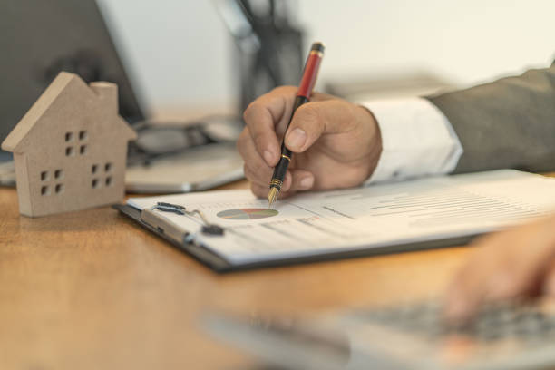 istock The accountant checking documents about graph and chart relating to financial reporting and tax accounting of the company 1153239710