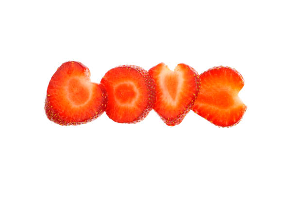 'Love', written with strawberries, isolated on white